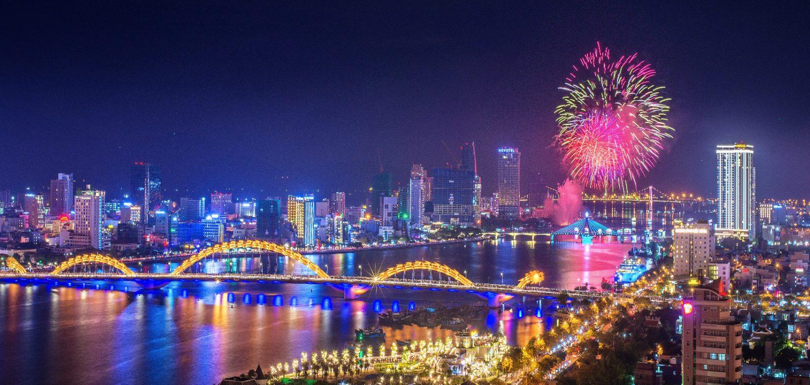 Han River and Dragon Bridge night skyline during a festival in Da Nang