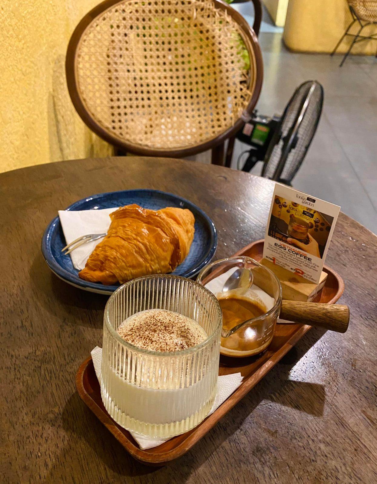 Close-up of a cup of Vietnamese egg coffee with thick whipped egg foam
