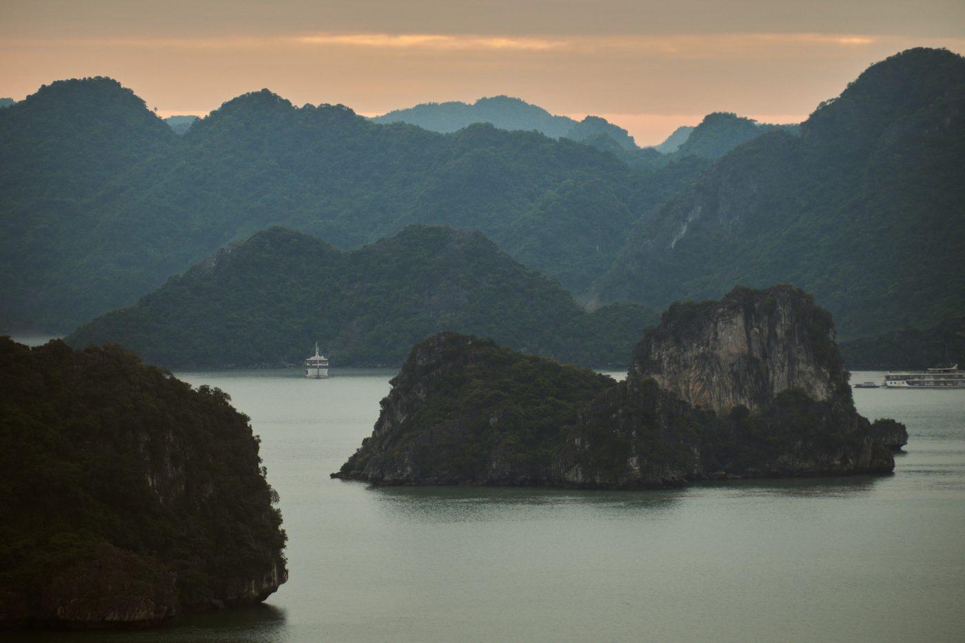 Limestone karsts rising from the water in Ha Long Bay, Vietnam