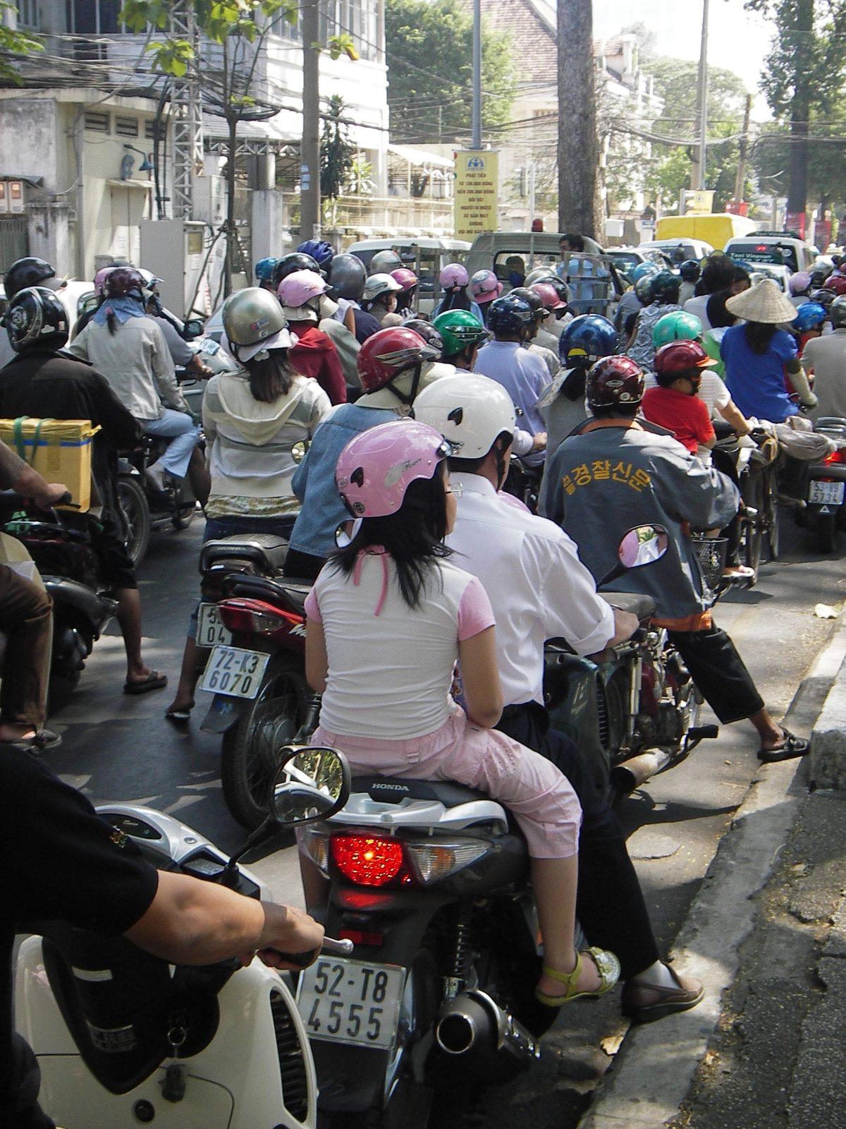 Dense motorbike traffic on a Ho Chi Minh City street