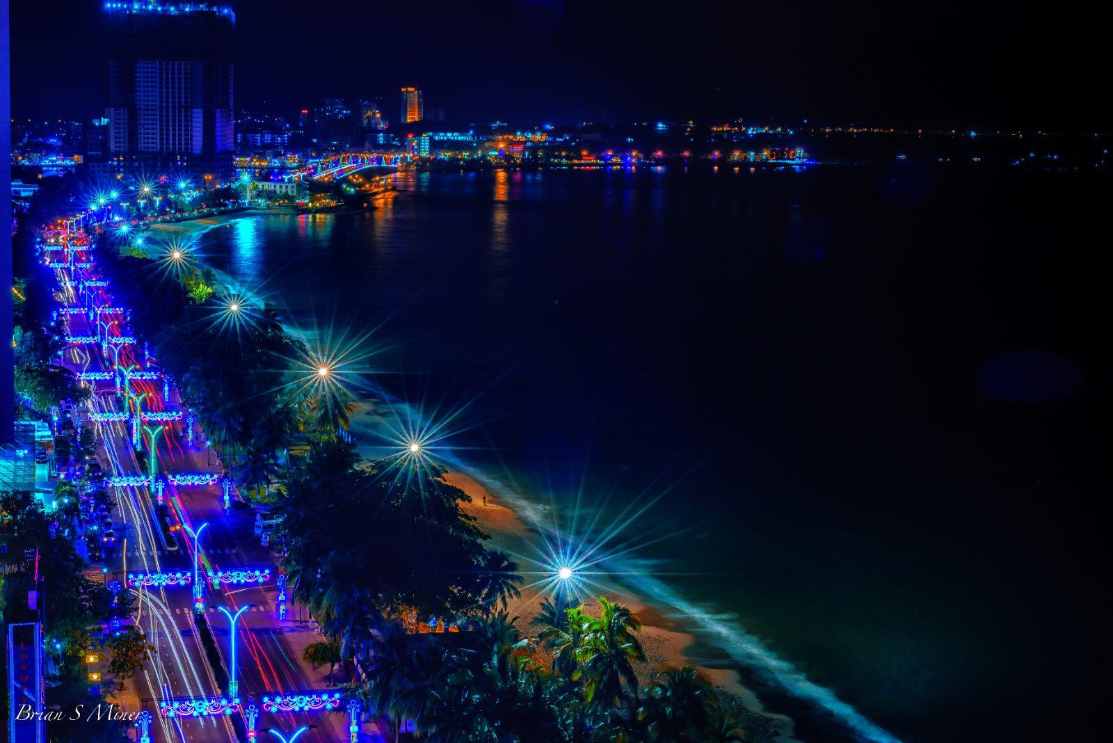 Nha Trang beachfront and skyline lit up at night