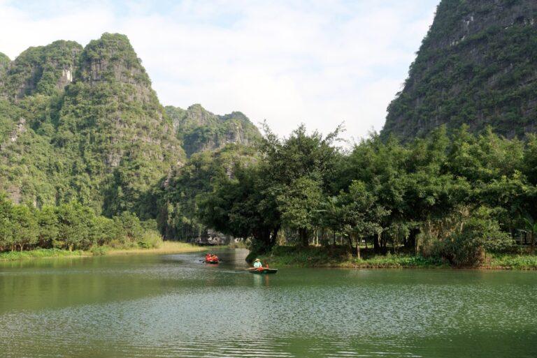 Sampan boat tour through the karst landscape of Trang An, Ninh Binh