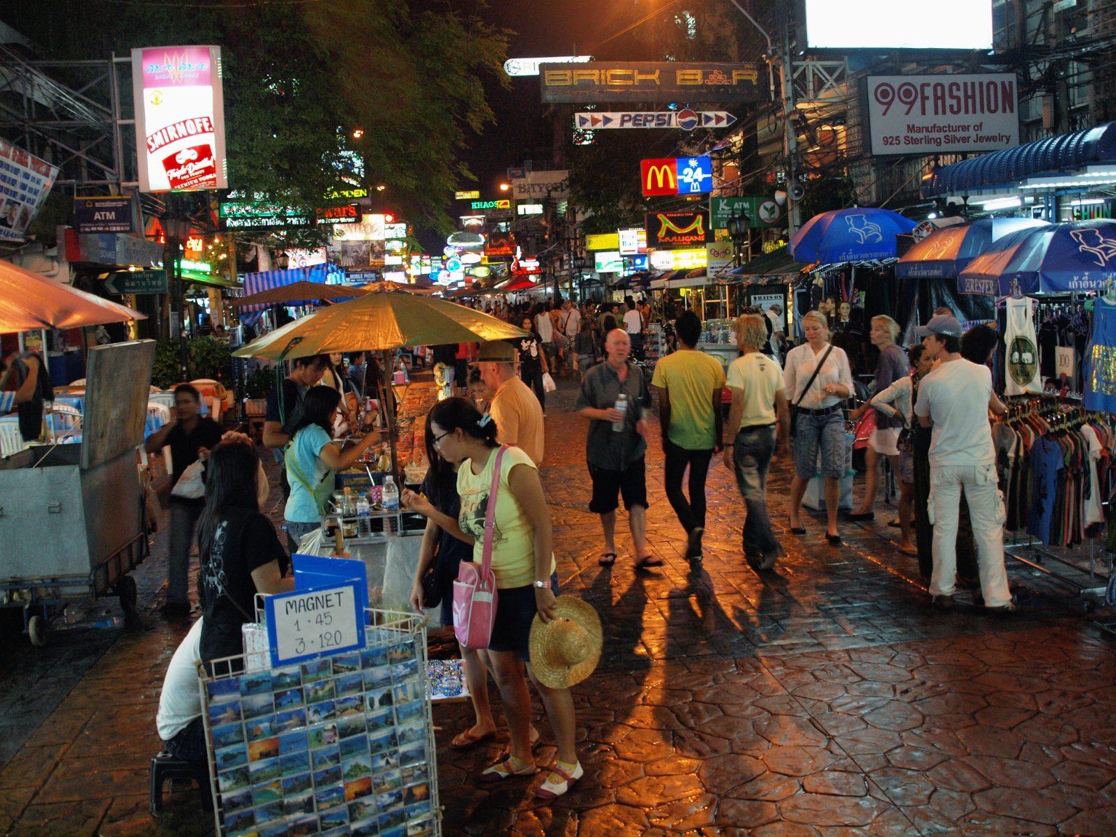 Khao San Road lit up in the evening with bars and street stalls