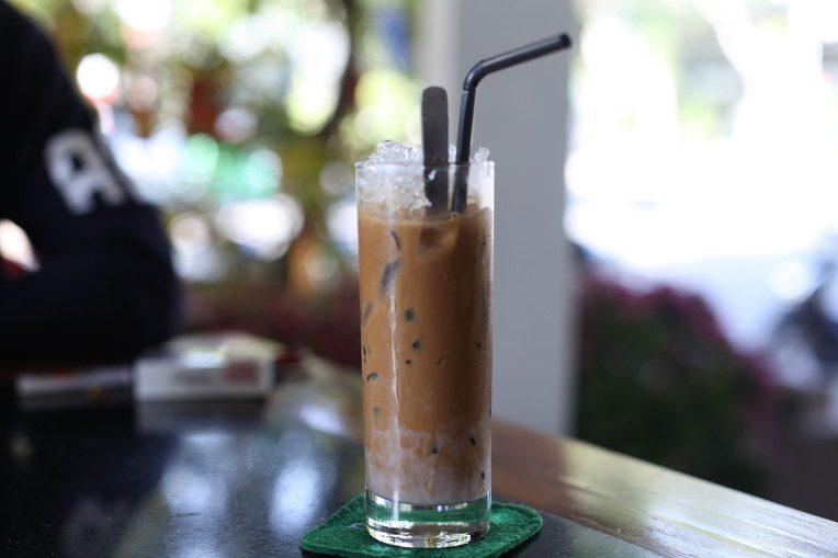A glass of ca phe sua da, Vietnamese iced coffee with condensed milk