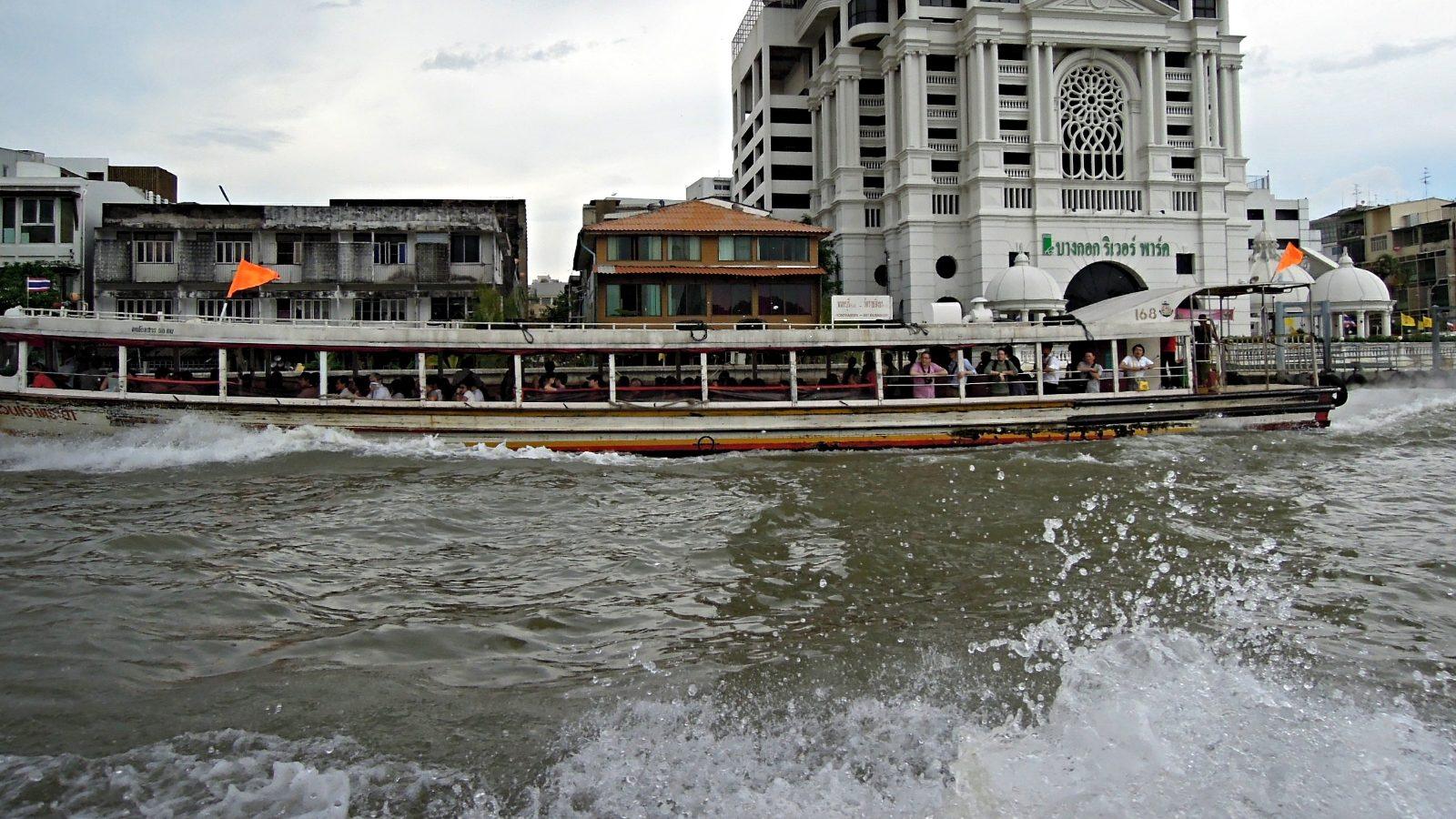 A Chao Phraya Express Boat ferrying passengers in Bangkok