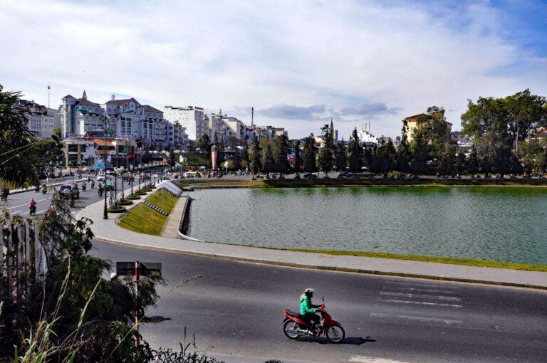 Xuan Huong Lake in the center of Da Lat, Vietnam, surrounded by pine trees