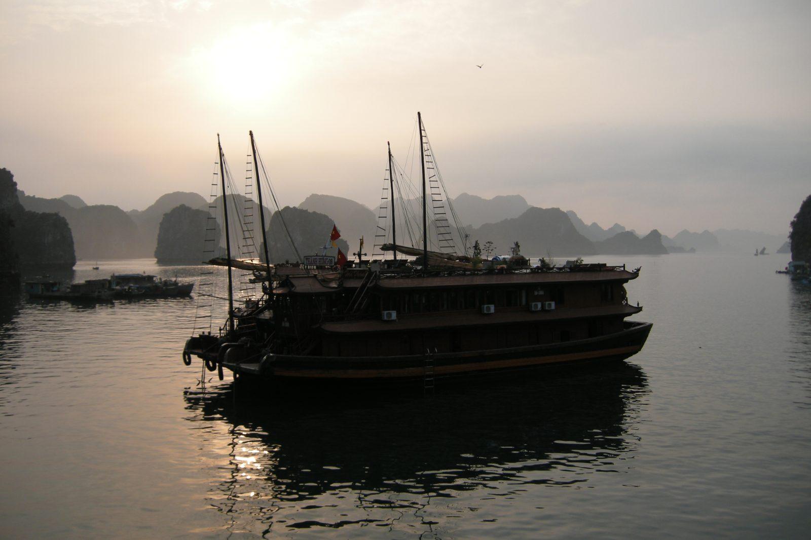 Sunset over the karst islands of Ha Long Bay, Vietnam