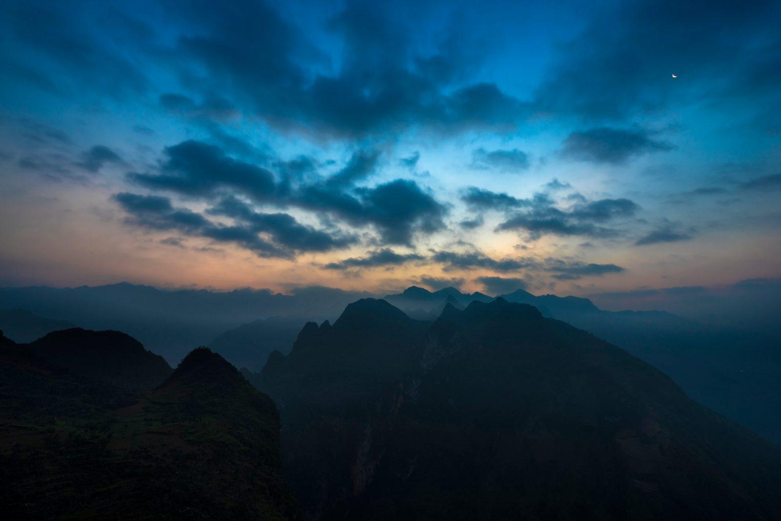 Winding mountain road at Ma Pi Leng Pass on the Ha Giang Loop, Vietnam