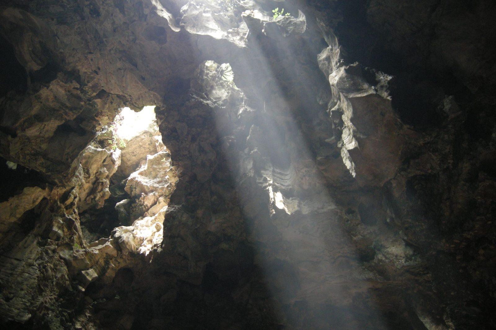 Natural light streaming into Huyen Khong Cave inside the Marble Mountains, Da Nang