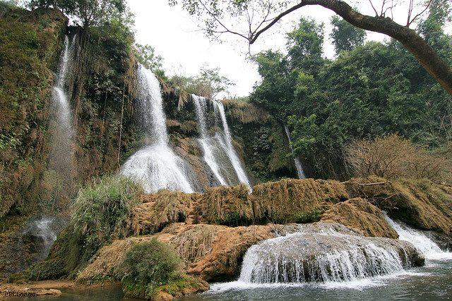 Dai Yem Waterfall cascading through the forest near Moc Chau, Vietnam