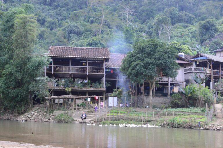 Tay ethnic stilt houses at Pac Ngoi village on the banks of the Nang River near Ba Be Lake