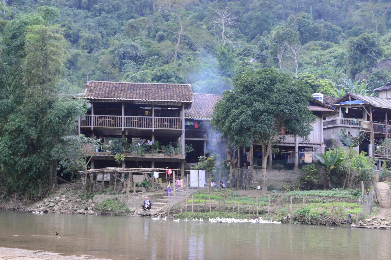 Tay ethnic stilt houses at Pac Ngoi village on the banks of the Nang River near Ba Be Lake