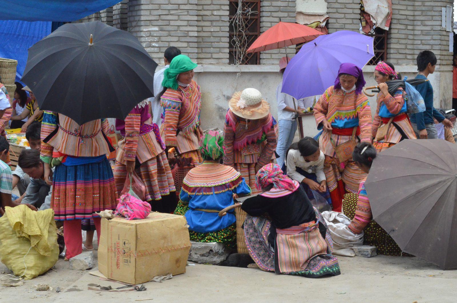 Flower Hmong traders at Bac Ha market day near Sapa, Vietnam