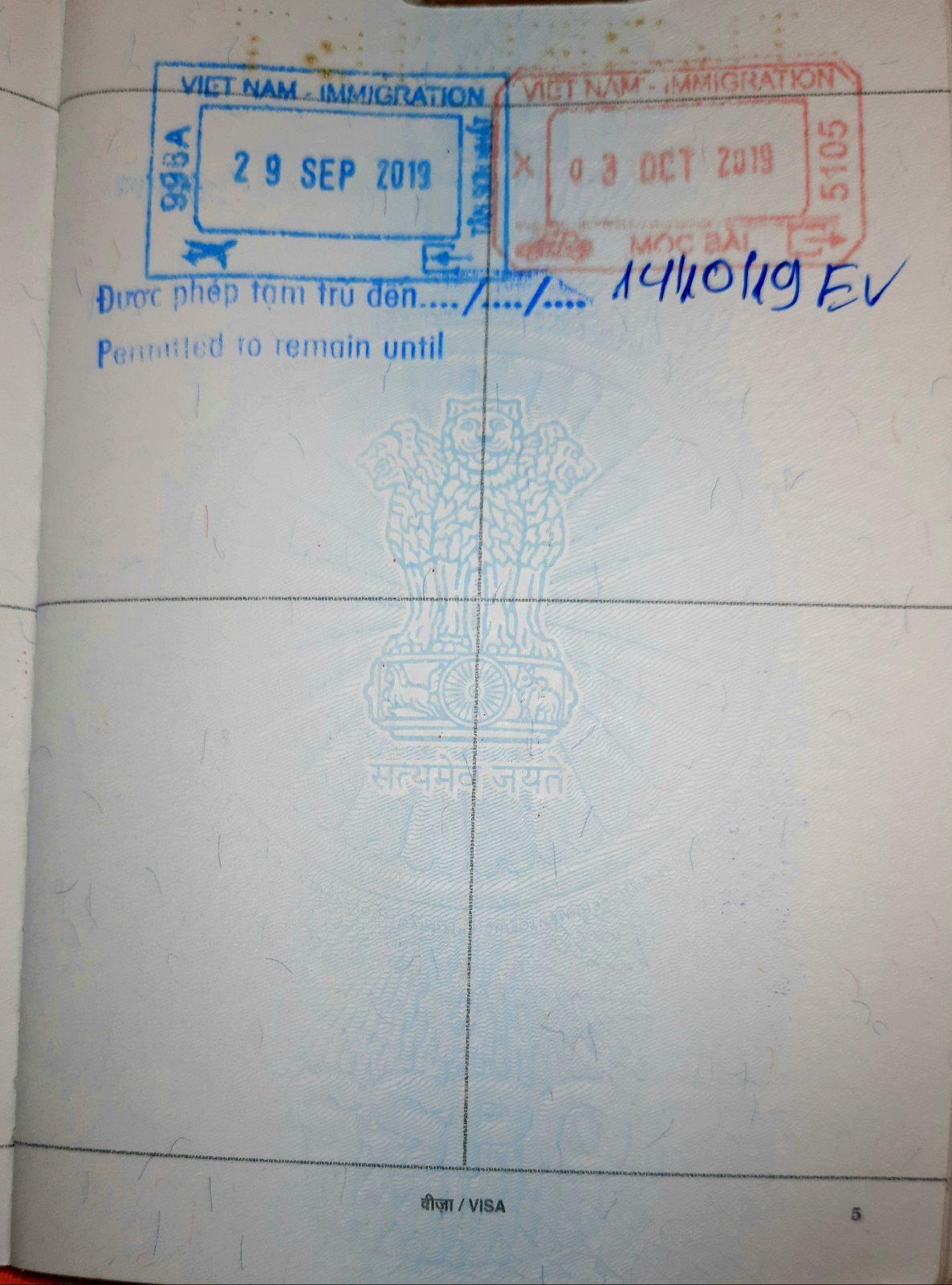 A Vietnam e-visa immigration stamp inside a passport