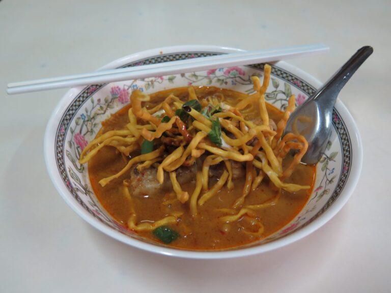 A bowl of khao soi, northern Thai curry noodle soup, in Chiang Mai