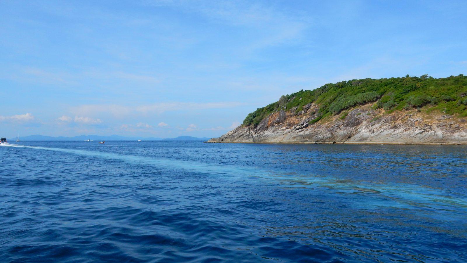 Clear blue water and coastline at Racha Island near Phuket